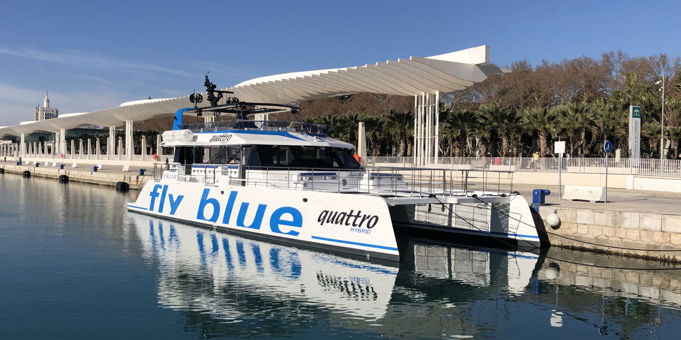 a picture of a tourist boat located at muelle uno, malaga, spain