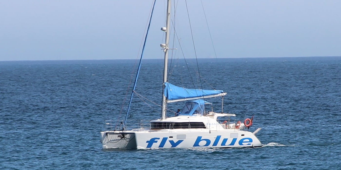 Fly-Blue-Catamaran-sailing-Malaga